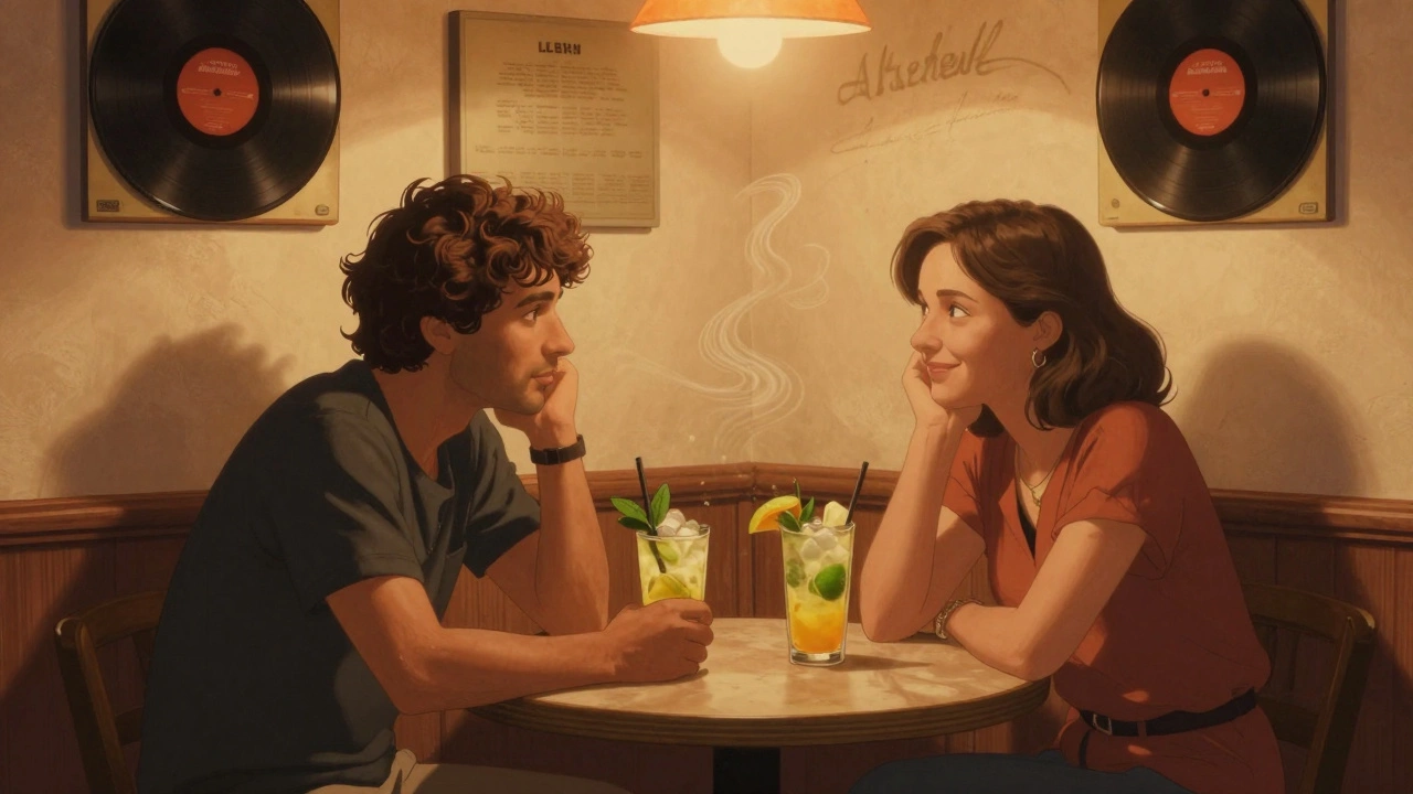 Two people sharing a quiet moment at a corner table, talking over drinks in a cozy club.